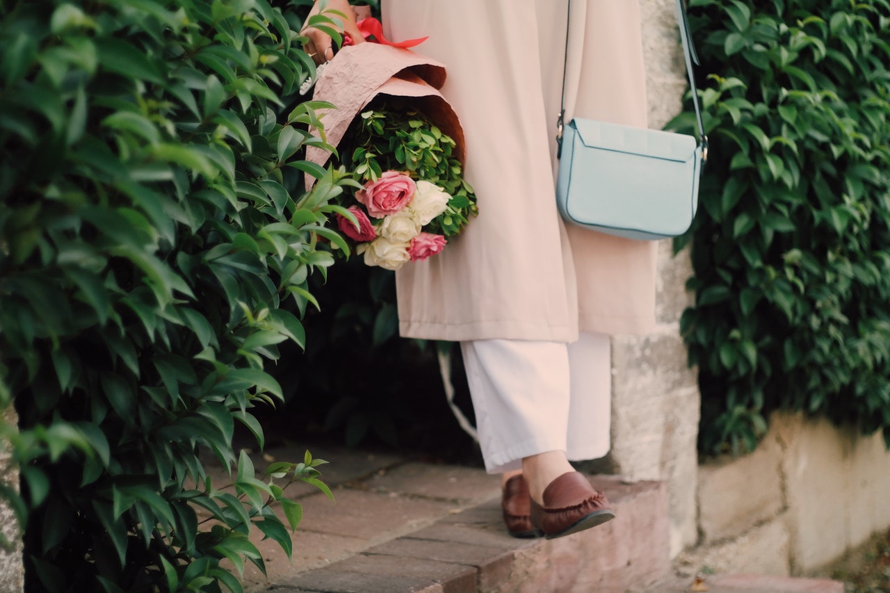 Woman is wearing Dress with pants underneath