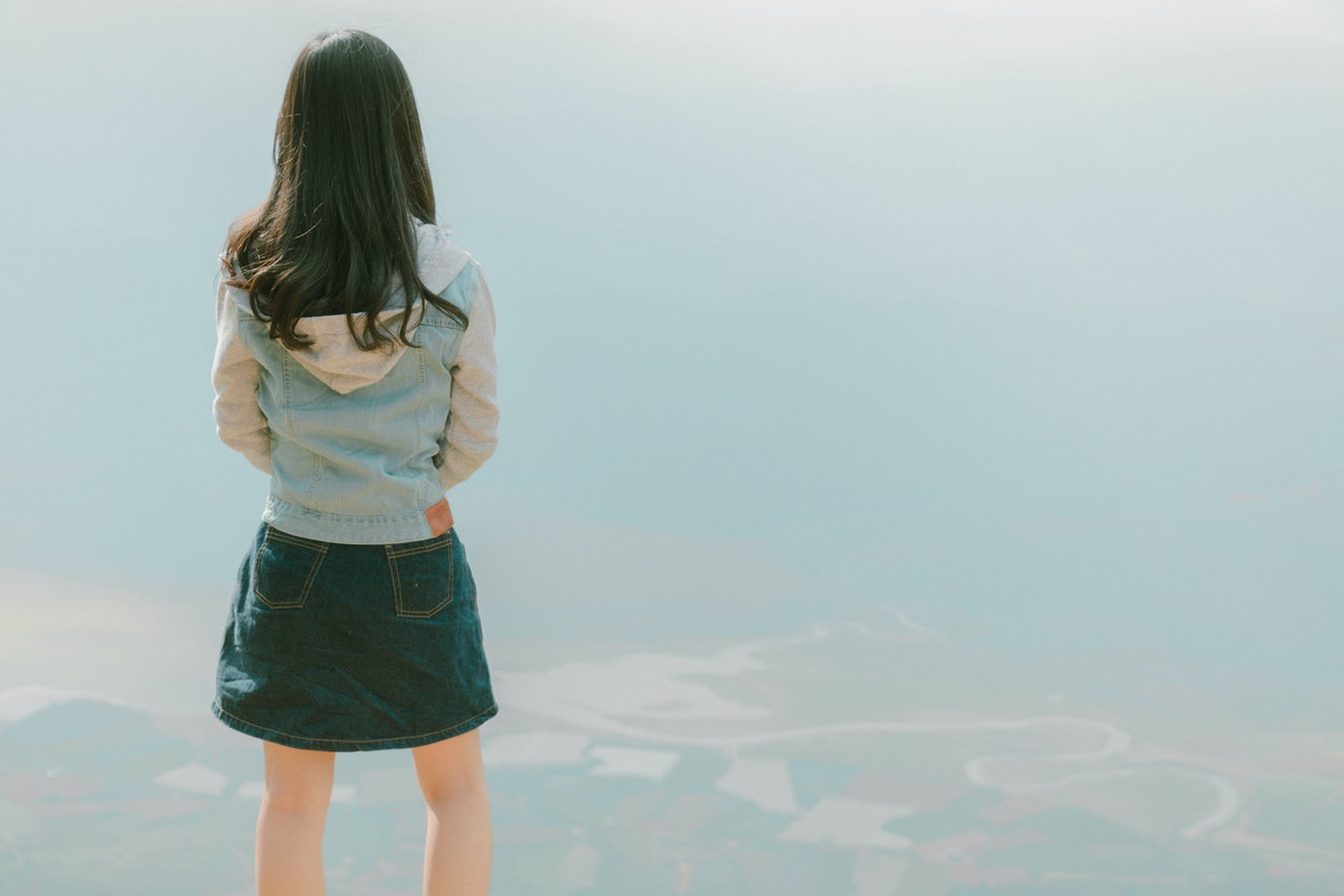 Girl wearing denim skirt